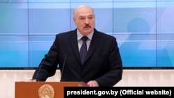 Belarusian President Alyaksandr Lukashenka speaks at a meeting with businesspeople in Minsk on December 22.