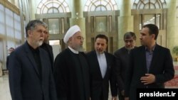 Iranian President Hassan Rouhani (2nd L) and his cabinet and office staff on May 25, 2019.