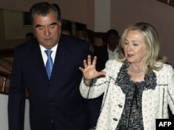 U.S. Secretary of State Hillary Clinton (right) meets with Tajik President Emomali Rahmon in Dushanbe