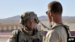 Staff Sergeant Robert Bales (left) is seen at the U.S. National Training Center in Fort Irwin, California, in an August 2011 image.