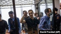 Men controversially accused of belonging to a terrorist group attend a court hearing in Penza on February 10.