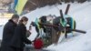 Ukraine - Petro Poroshenko and is wife lay flowers at the grave of Mikhail Zhyzneuski, 20Jan2016