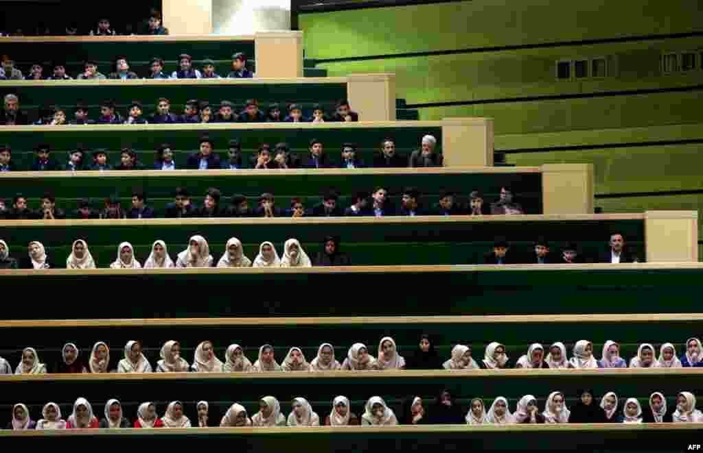 Iranian schoolgirls attend a parliament session in Tehran. (AFP/Atta Kenare)