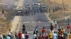 Стычки между палестинскими демонстрантами и израильскаими солдатами на Западном берегу Иордана 