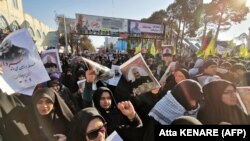 Iranian mourners gather for the burial of slain top general Qasem Soleimani in his hometown Kerman on January 7.