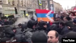 Azerbaijanis and Armenians scuffle over Nagorno-Karabakh in Moscow Victory Day commemoration.