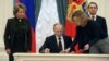 Putin Signs Contentious Terror Law