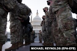Members of the U.S. National Guard assemble on the grounds of the U.S. Capitol on January 12, 2021.