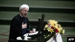 President Hassan Rohani speaks before the Iranian parliament in Tehran in mid-August.
