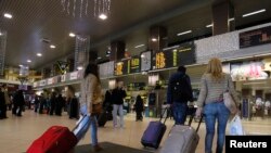 Air travelers at the Bucharest international airport.