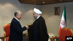 Hassan Rohani və Yukiya Amano 