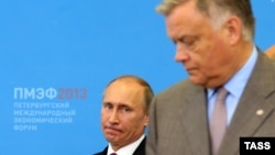 Сын Владимира Якунина (на фото справа) Андрей весной заявил, что никогда не голосовал за Путина