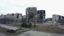 Clădiri rezidențiale avariate în timpul invaziei rusești, Mariupol, 18 martie 2022.