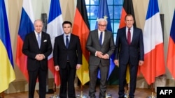 Лоран Фаб’юс, Павло Клімкін, Франк-Вальтер Штайнмаєр і Сергій Лавров (л -> п) перед початком зустрічі в Берліні, 13 березня 2015 року
