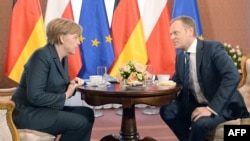 Merkel dhe Tusk - Varshavë, 12 mars 2014.