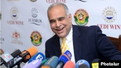 Raffi Hovannisian speaks with reporters in Yerevan on April 29.