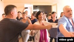 Kazakhstan – Akzhol Akhmetova was involved in an attack on journalists in Almaty, and later seen working in a municipal office.