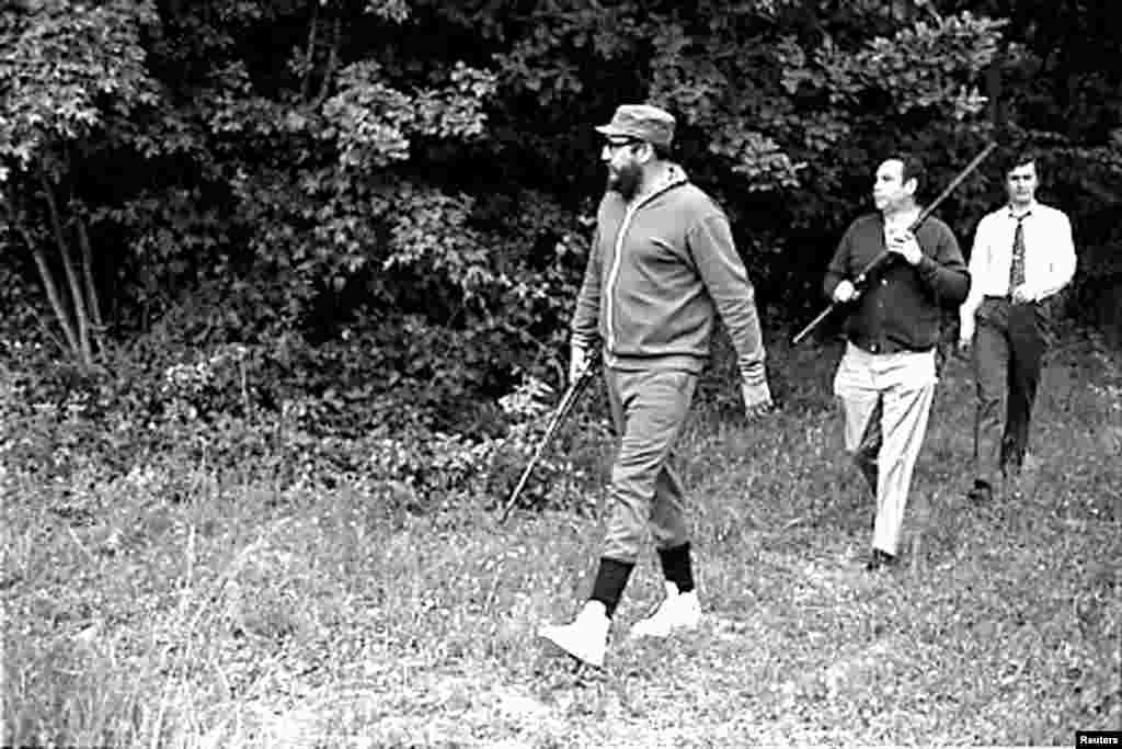 Castro (front) managed a spot of hunting while on a visit to Romania in May 1972 when the country was ruled by communist dictator Nicolae Ceausescu. 