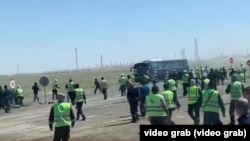 Videos and photos that circulated on social media on June 29 showed Tengiz oil-field workers punching and kicking co-workers.