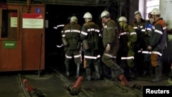 "АрселорМиттал Теміртау" компаниясы шахтасында жұмыс істейтін кеншілер. Көрнекі сурет.