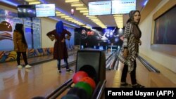 FILE: Afghan women play at a bowling club in Mazar-e Sharif.