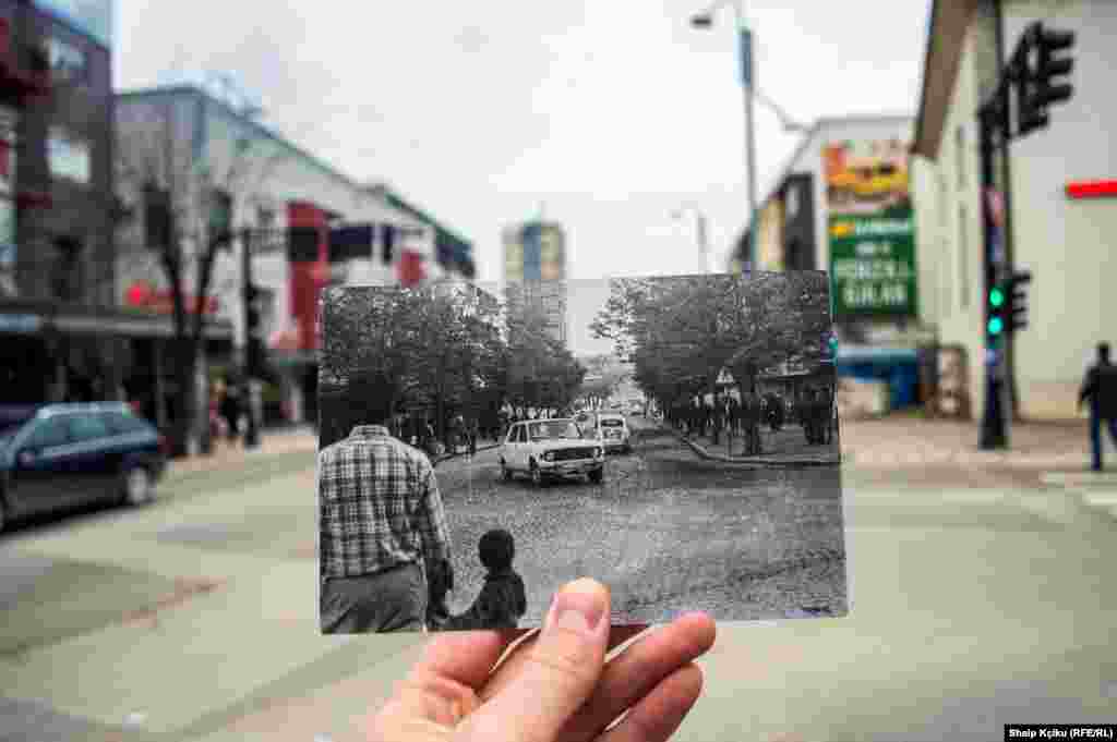 Shaip Kçiku got out of bed extra early that day. He told RFE/RL, &quot;I wanted to make sure the streets were empty to take the photo.&quot; The print he&#39;s holding shows the Gjilan neighborhood as it looked in the 1970s.