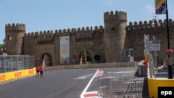 Officials have pushed aside their usual concerns for preserving the historic feel of Baku's old quarter and resurfaced some of its cobblestone streets with a thick coat of high-speed asphalt.