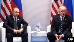 Владимир Путин и Дональд Трамп на саммите G20 в Гамбурге. 7 июля 2017 года
