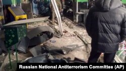 Damage is seen inside the supermarket following the bombing.