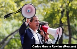 Venezuelan opposition leader Juan Guaido talks to supporters in Caracas on April 30.