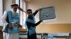 FILE: Afghan election commission workers prepare ballot papers for counting of the presidential election in Kabul in late September.