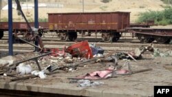 A destroyed tea stall is seen at the scene following an overnight bomb explosion at the Sibi railway station in southwestern province of Balochistan late on June 27.