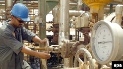 One official noted the cuts show Iraq's dependency on oil revenues.