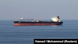 FILE PHOTO: Oil tankers pass through the Strait of Hormuz, December 21, 2018.