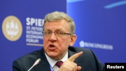 Russian former Finance Minister Aleksei Kudrin speaking at the St. Petersburg Economic Forum 