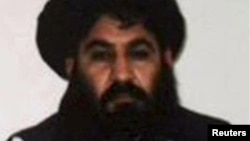 Mullah Akhtar Mohammad Mansur, the Taliban's new leader, is seen in this undated handout photograph by the Taliban. 