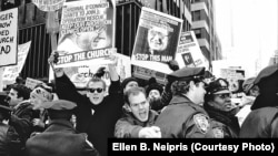 Protesters gather outside St. Patrick's Cathedral in New York on December 10, 1989.