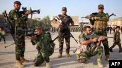 متطوعون جدد في الجيش العراقي يتدربون في البصرة