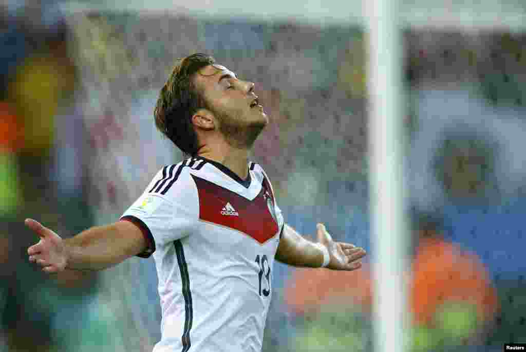 Germany's Mario Goetze celebrates after scoring against Argentina during extra time in their 2014 World Cup final at the Maracana stadium in Rio de Janeiro July 13, 2014. 