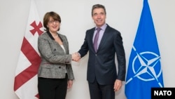 Georgian Foreign Minister Maia Panjikidze (left) and NATO Secretary-General Anders Fogh Rasmussen at NATO Headquarters earlier this year. 