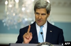 U.S. Secretary of State John Kerry speaks about the situation in Syria from the Treaty Room at the State Department on August 30.