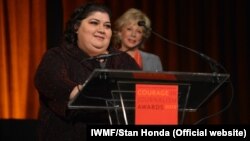 Khadija Ismayilova accepting the 2012 "Courage in Journalism" award from the International Women's Media Foundation in New York in October.