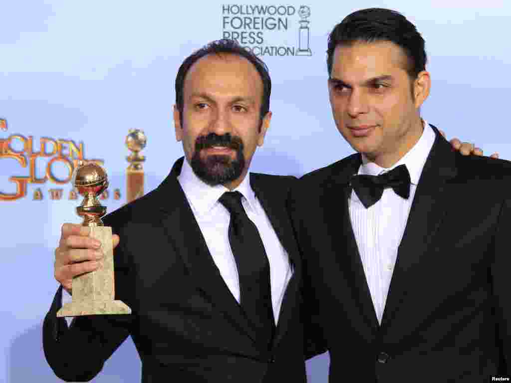 پیمان معادی (راست) بازیگر فیلم &laquo;جدایی نادر از سیمین&raquo; همراه با اصغر فرهادی، کارگردان