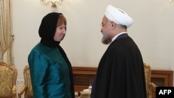 Iranian President Hassan Rohani (right) meets with EU foreign-policy chief Catherine Ashton in Tehran in March.