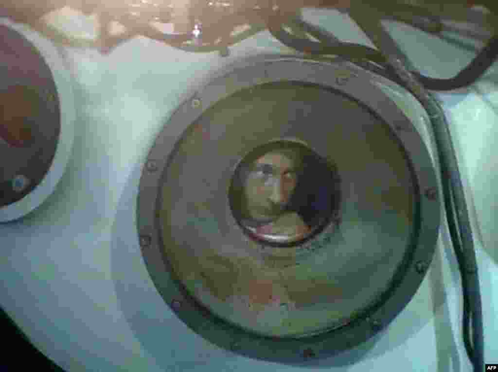 Putin inside a submersible during a dive into the depths of Lake Baikal in August 2009.