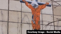 Гагарин на кресте. Граффити Александра Жунева в Перми