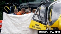 Paramedics lift a man into a rescue helicopter in Goeppingen, Germany, 29 May 2018.