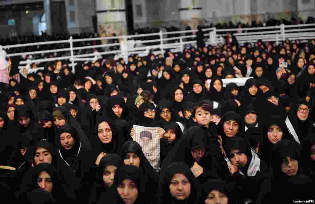 A crowd of people gather around the mausoleum of the founder of the Islamic republic, Ayatollah Ruhollah Khomeini, during a ceremony on the occasion of the 29th anniversary of his death, in a suburb of Tehran on June 4. (AFP)