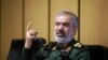 Iran Guards' Commander Says Protesters Shot Comrades In The Back