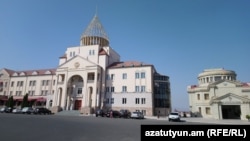 Nagorno-Karabakh -- The buildings of the Karabakh parliament (left) and a local association of war veterans, Stepanakert, September 7, 2018.